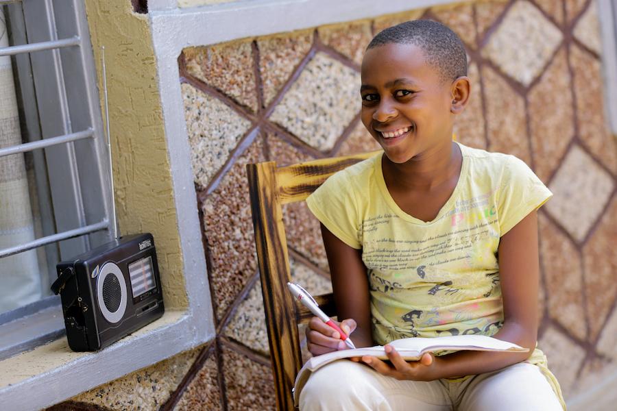 In Rwanda, when schools were closed due to COVID-19, students like Umuhoza, 11, could listen to lessons on the radio. 