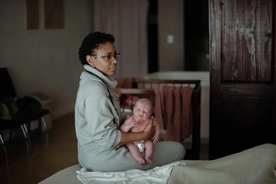 Woman Holding Newborn Baby