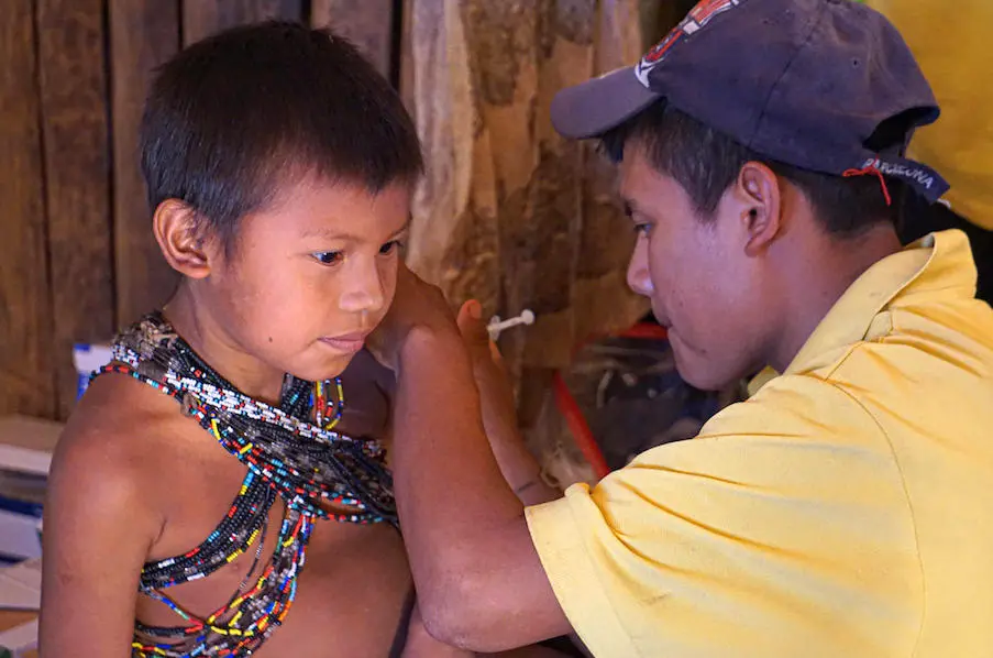 A UNICEF-supported nurse from the Hoti ethnic group vaccinates a child at the ambulatory health care center of the community of San José de Kayamá, Bolivar, Venezuela, on February 24, 2020. A UNICEF-supported nurse from the Hoti ethnic group vaccinates a child at the ambulatory health care center of the community of San José de Kayamá, Bolivar, Venezuela, on February 24, 2020.