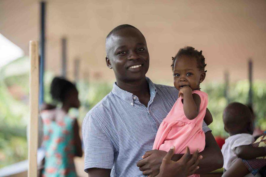 “I am responsible for her health,” says Herbert, who, even after their grueling two-hour journey to the nearest health center, still kept Donatel smiling. “I know that immunization will strengthen her immune system, which will help her fight other disease