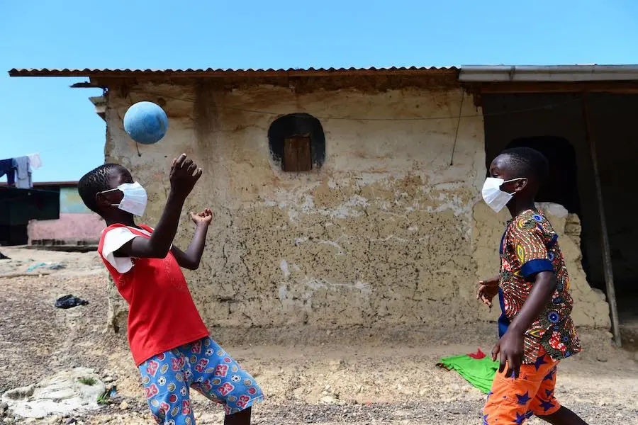 Two Kids Playing with a Ball
