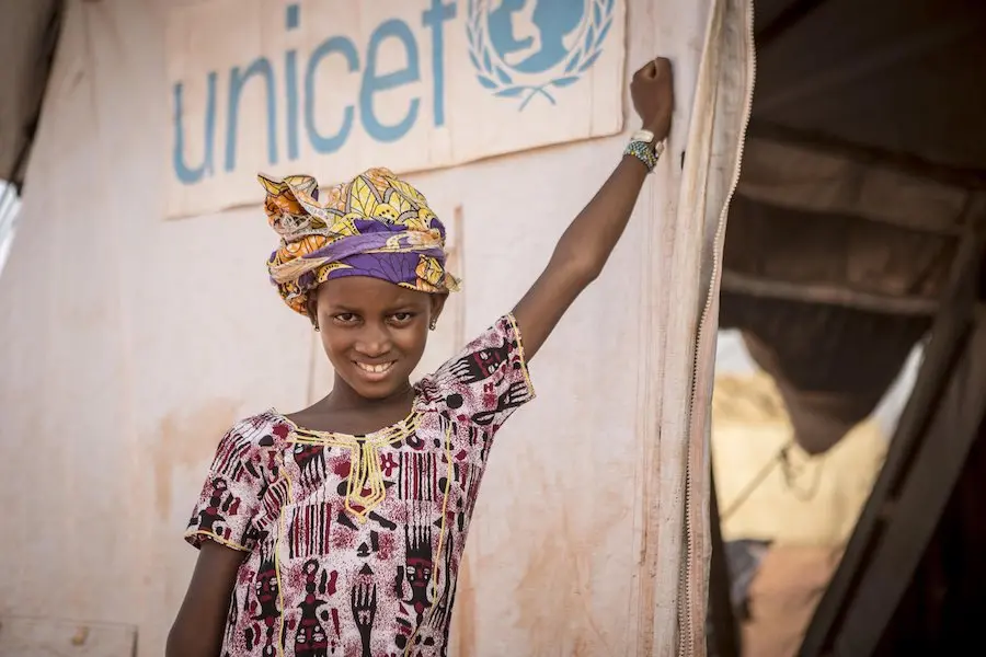 Hamsatou Bolly, 13, a displaced girl from Mopti, fled her village in Bankass when it was attacked by armed men in 2019. “I was terrified," she says. "I thought I was going to get killed.” Today, she’s healing at a UNICEF-supported Child-Friendly Space. Hamsatou Bolly, 13, a displaced girl from Mopti, fled her village in Bankass when it was attacked by armed men in 2019. “I was terrified," she says. "I thought I was going to get killed.” Today, she’s healing at a UNICEF-supported Child-Friendly Space.