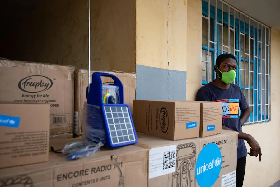 UNICEF provided exercise books and rechargeable portable radios so children in Mbandaka, Democratic Republic of Congo could continue learning during the COVID-19 pandemic. UNICEF provided exercise books and rechargeable portable radios so children in Mbandaka, Democratic Republic of Congo could continue learning during the COVID-19 pandemic.