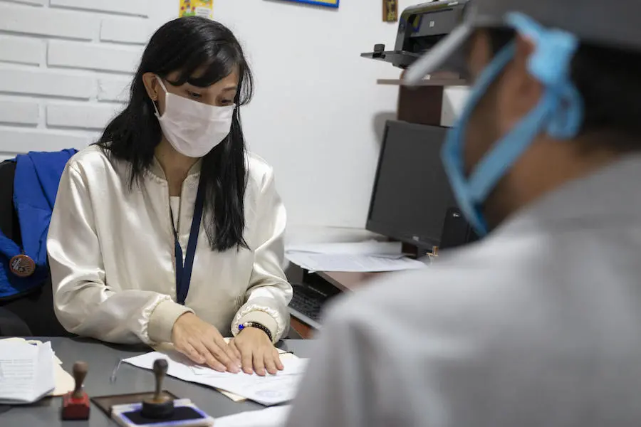 Maria José, a UNICEF-supported child protection counselor in Venezuela's Táchira state, at her desk on July 22, 2020. Maria José, a UNICEF-supported child protection counselor in Venezuela's Táchira state, at her desk on July 22, 2020.