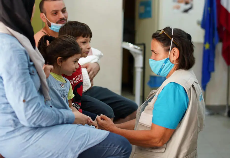 In the aftermath of a deadly port explosion in Beirut, a UNICEF doctor provides care and support to affected children and families at a UNICEF-supported health center. In the aftermath of a deadly port explosion in Beirut, a UNICEF doctor provides care and support to affected children and families at a UNICEF-supported health center.