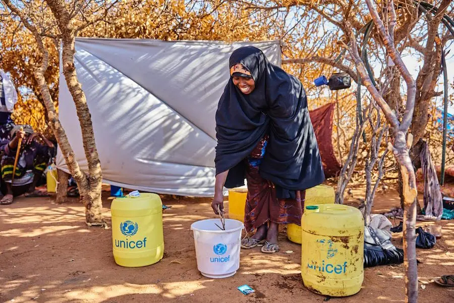 In Kenya’s Garissa County, Habiba Rage demonstrates how she uses household water treatment chemicals provided by UNICEF. In Kenya’s Garissa County, Habiba Rage demonstrates how she uses household water treatment chemicals provided by UNICEF.