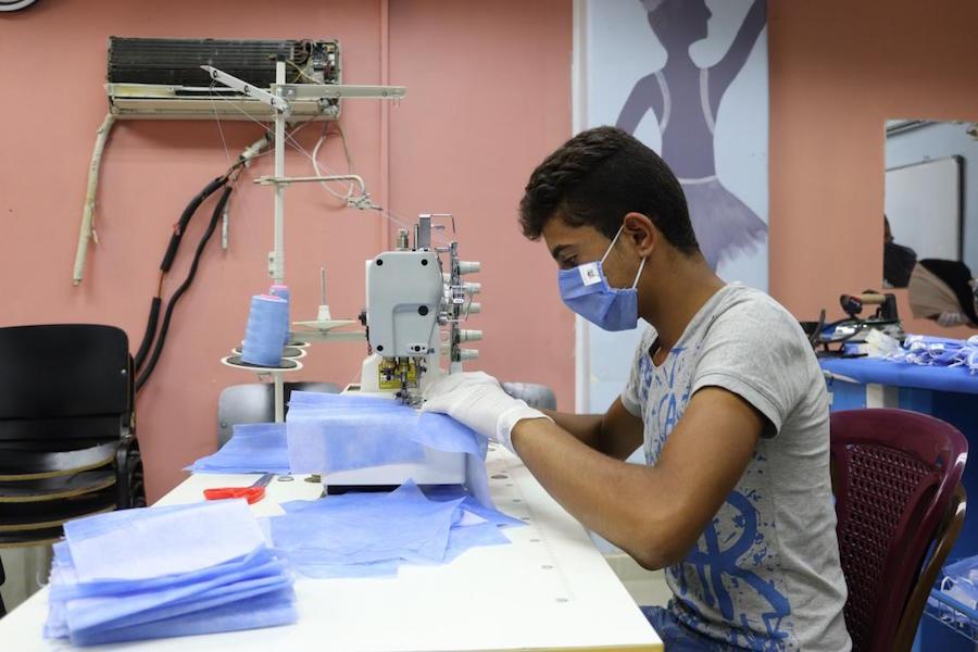 Majd, 17, is a trainee in a sewing course at the UNICEF-supported youth center in Jaramana, rural Damascus, Syria. 