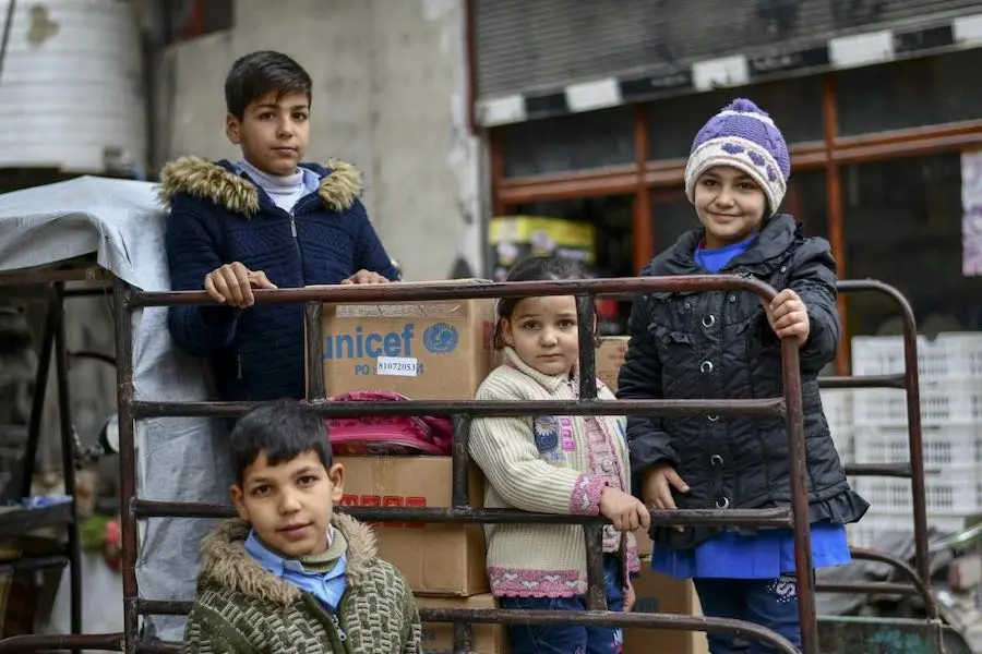 Siblings Firas ,12, Mohammad ,11, Batoul ,8, and Fatima, 3, all received new winter clothing kits, distributed by UNICEF in Hamourieh, rural Damascus, thanks to a generous contribution from Canada and DFID. “Since I lost my husband four years ago, life ha Siblings Firas ,12, Mohammad ,11, Batoul ,8, and Fatima, 3, all received new winter clothing kits, distributed by UNICEF in Hamourieh, rural Damascus, thanks to a generous contribution from Canada and DFID. “Since I lost my husband four years ago, life ha