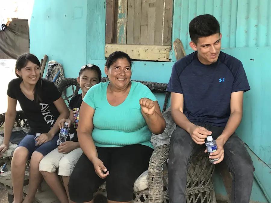 Family Sitting Outside