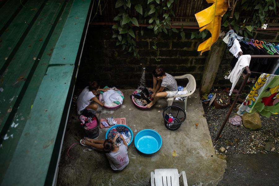 Aerial Shot of People Washing Clothes