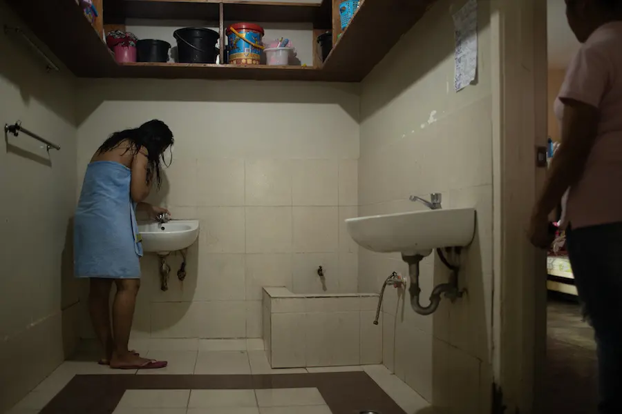 Person Using Sink