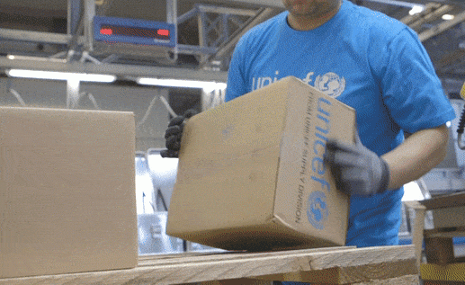 Person Packing UNICEF Box