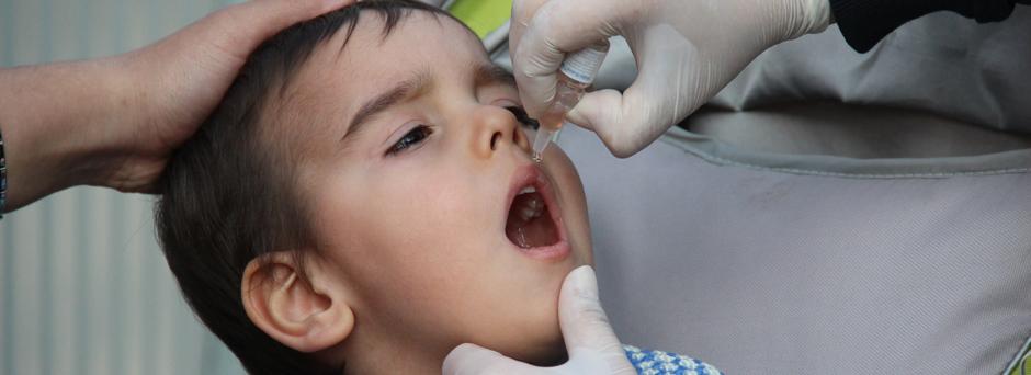 On 20 February 2014 in Turkey, a boy receives a dose of oral polio vaccine, in Osmaniye Province. Turkey