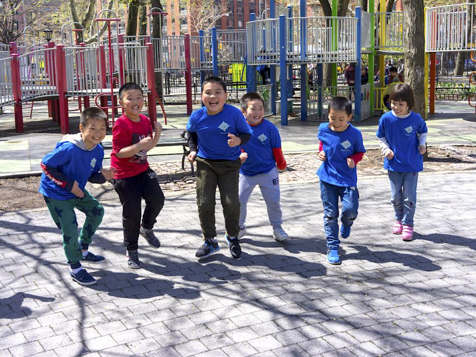 Students of P.S. 42 in New York City challenge each other to a running race to earn more Kid Power points.