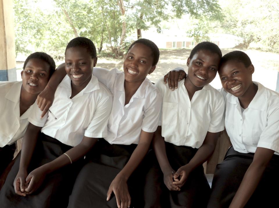 The K.I.N.D. Fund, a partnership between UNICEF and MSNBC's Lawrence O'Donnell, provides scholarships to students in Malawi like Rehema, far right.
