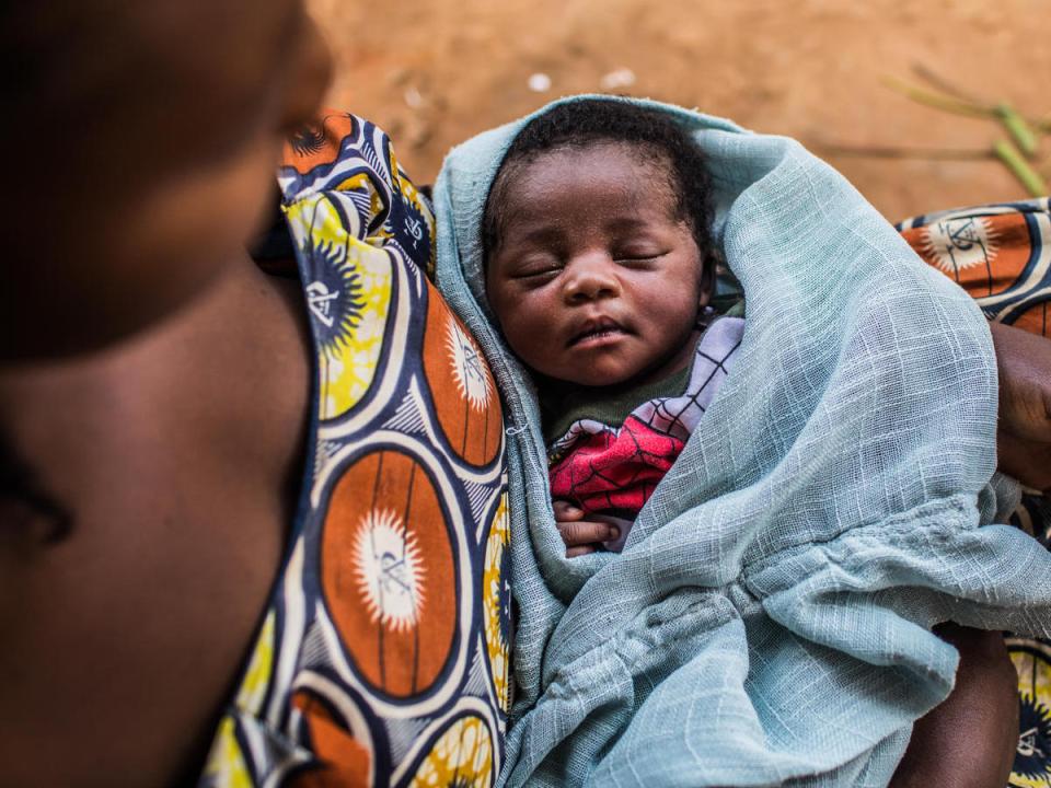 Mujinga, 30, holds her 2-week-old daughter, Francine, in Kananga, Kasai-Occidental Province, Democratic Republic of Congo in March 2019. 