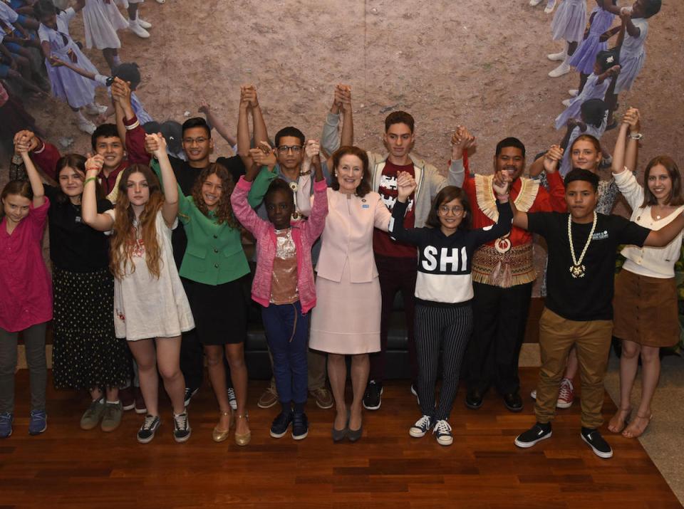 On 23 September 2019, UNICEF Executive Director Henrietta Fore joins hands with youth climate activists, prior to a dialogue at UNICEF House in New York City.