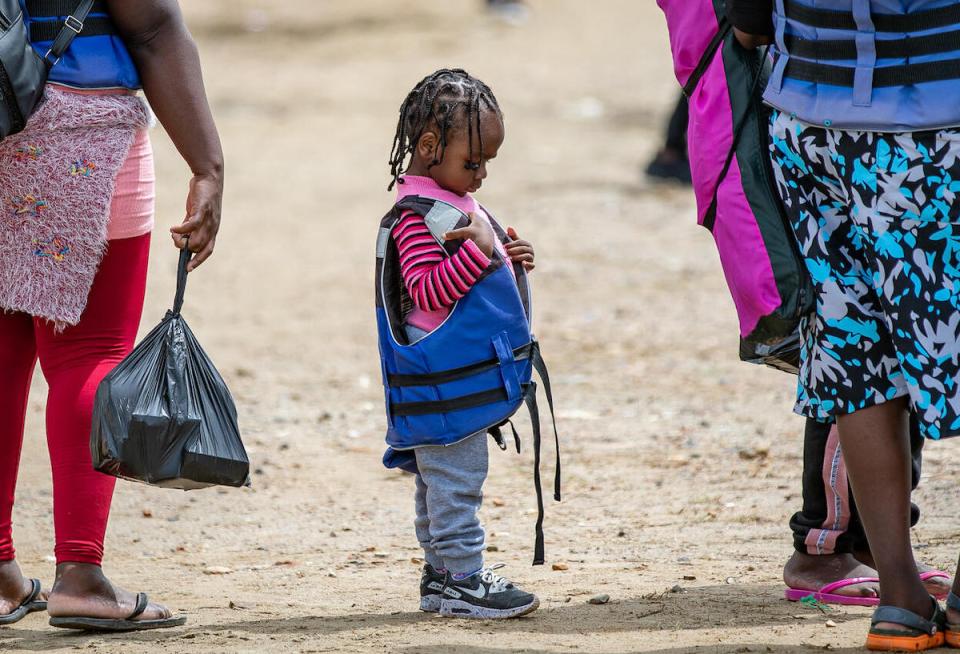 A child migrant from Haiti on the move.