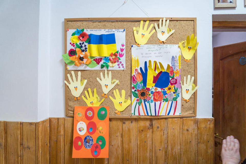 Artwork by children from Ukraine on display at the Baicoi Center in Prahova County, Romania, a facility that reopened its doors to care for over two dozen refugee children with special needs.
