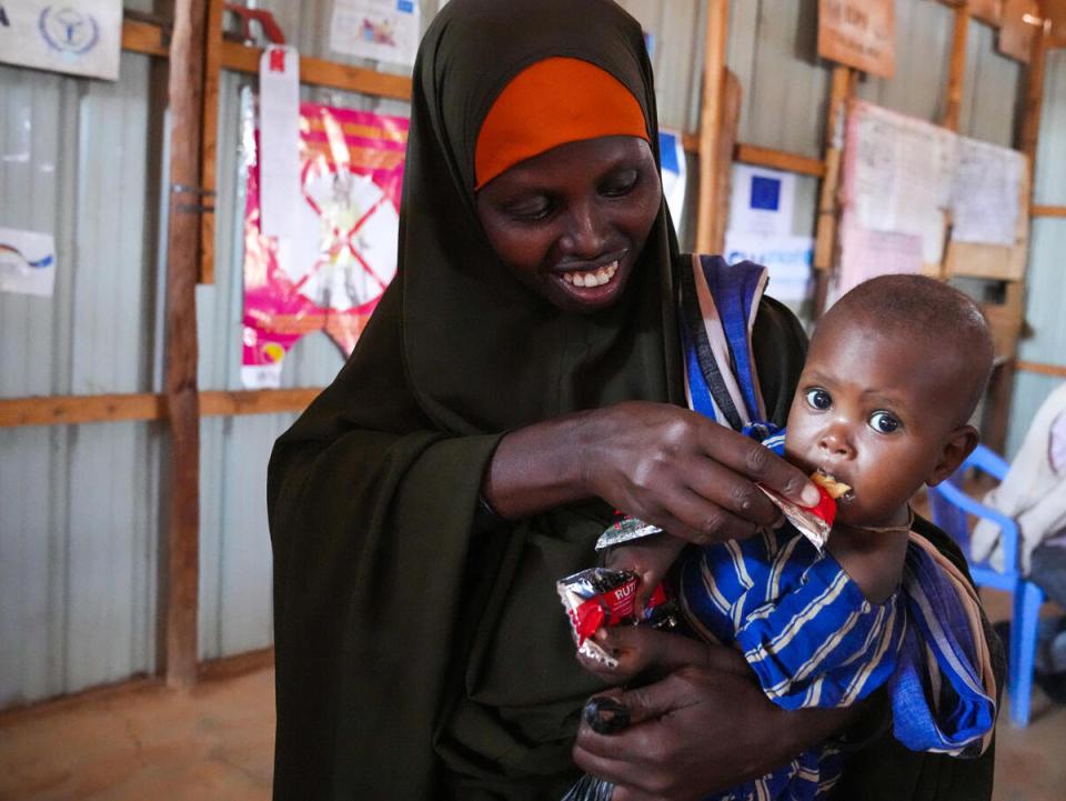On May 24, 2022, 10-month-old Ubah is fed Ready-to-Use Therapeutic Food by her mother at UNICEF-supported Dollow Health Center in Somalia. 