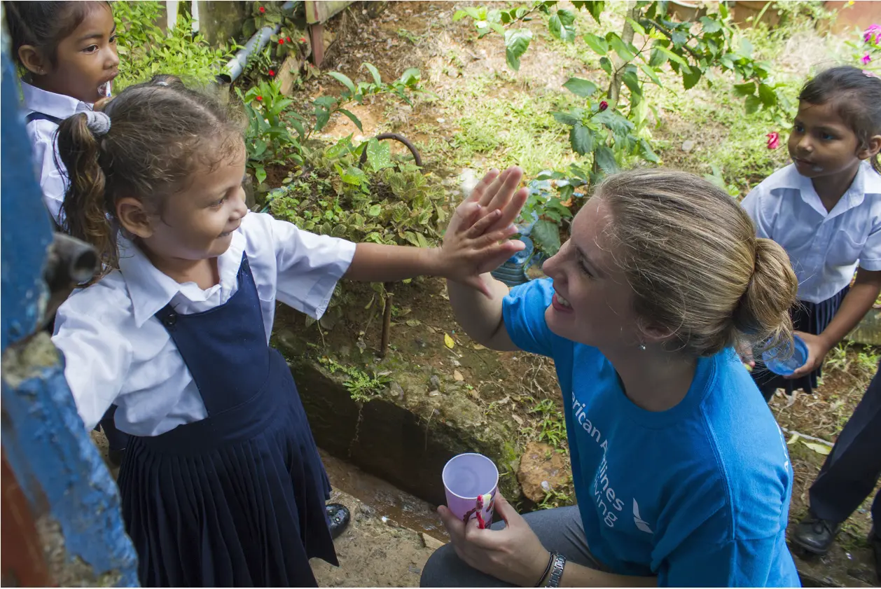 Woman and Child High-Fiving