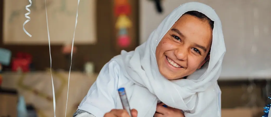 Ghana, 11, took part in an art activity at a UNICEF-supported Makani center in Jordan.