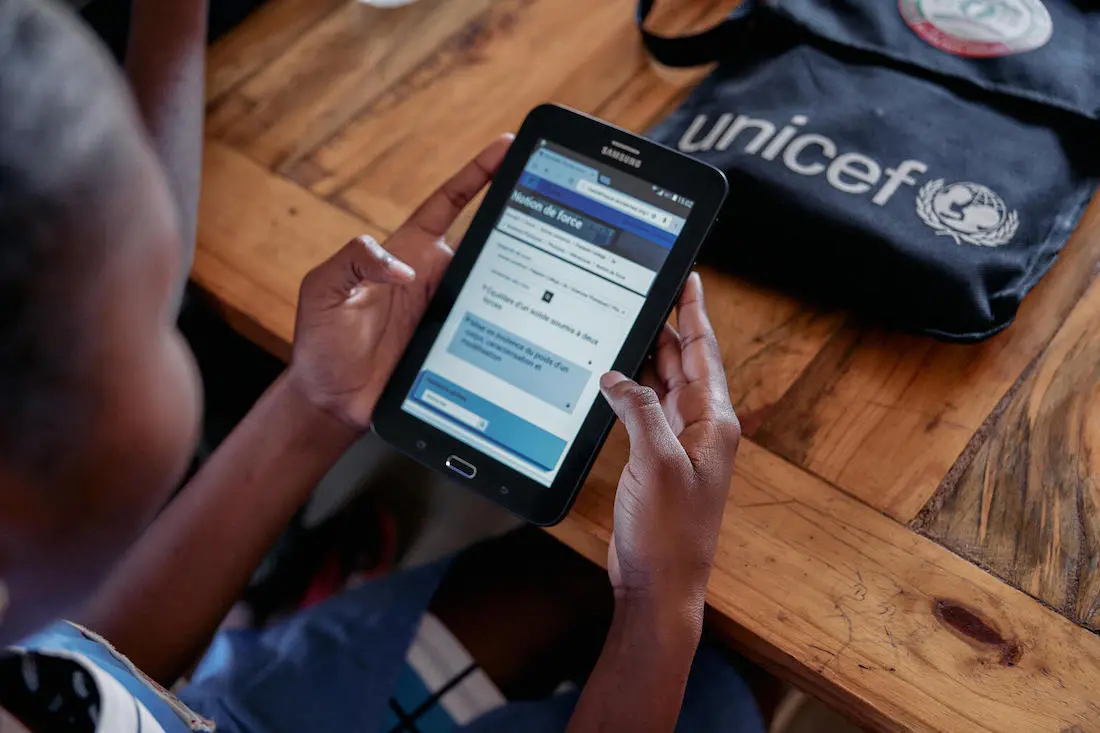 A high school student uses a tablet to access online courses at the Mahajanga’s Public General Education College Charles Renel in the Boeny Region of Madagascar.