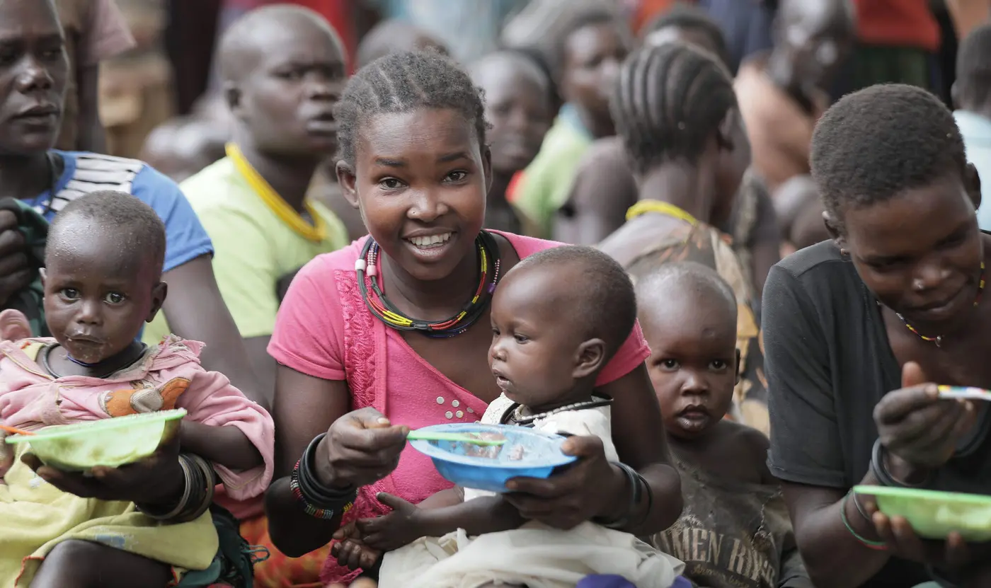 Moms and children eating.