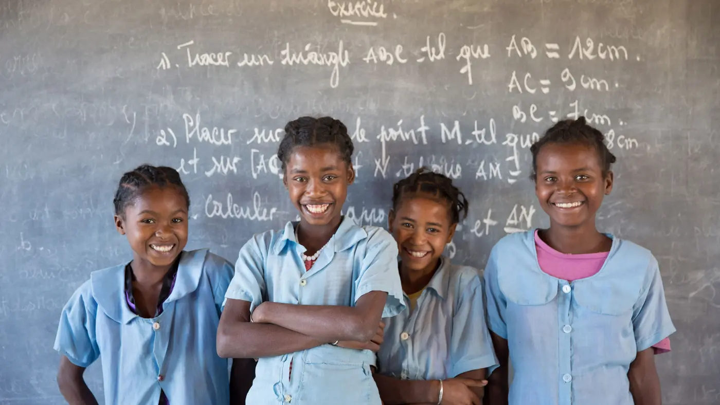Soanafiny (second from the left), 14, studies in the secondary school of Berano (Anosy region). Thanks to the catch-up class (Let Us Learn), a UNICEF supported program she is now studying in third grade after stopping  the school for a year.