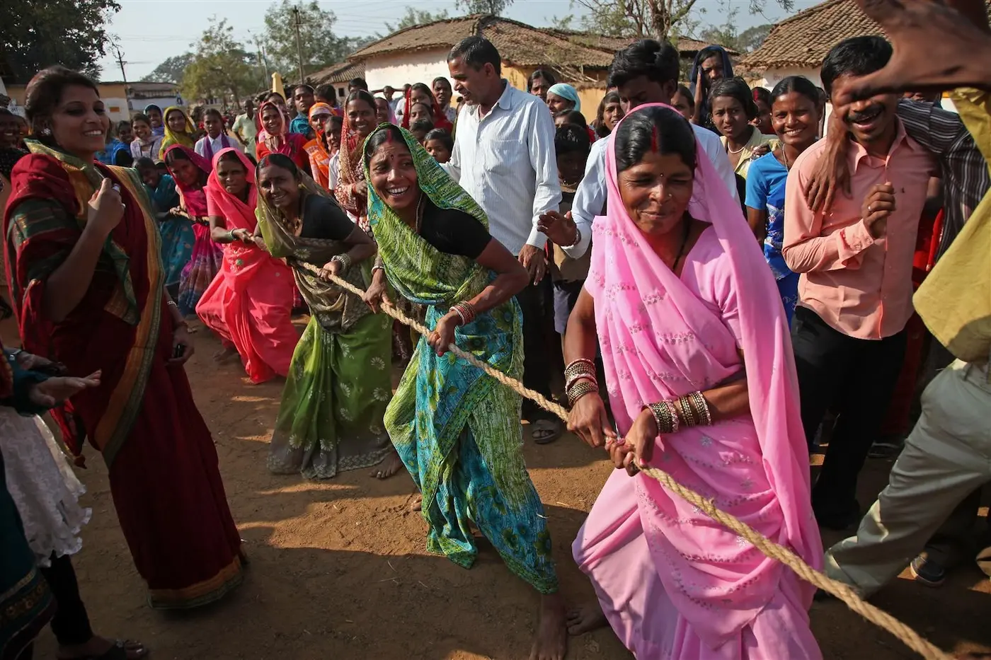 TOP PHOTO: Villagers from Mathaldbri village, India participate in a community sports day that was organized by volunteers in the UNICEF funded Messengers of Knowledge program.