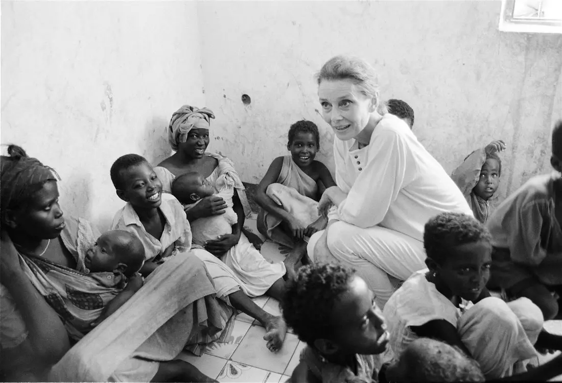 UNICEF Goodwill Ambassador Audrey Hepburn meets mothers and children greets children and women at a feeding center in Mogadiscio, Somalia in 1992.  