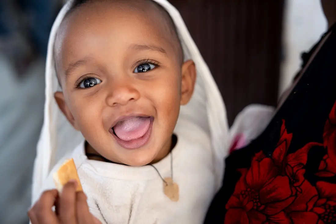 A 1-year-old baby receives services at a UNICEF-supported health center in Amhara region of Ethiopia in December 2024.