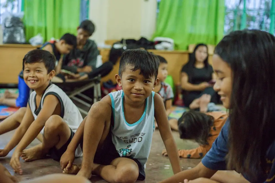 Ian, 7, shelters at Reserva Elementary School with his family in Baler, Aurora, the Philippines as the province braces for the impact of Super Typhoon Uwan (Fung-wong)
