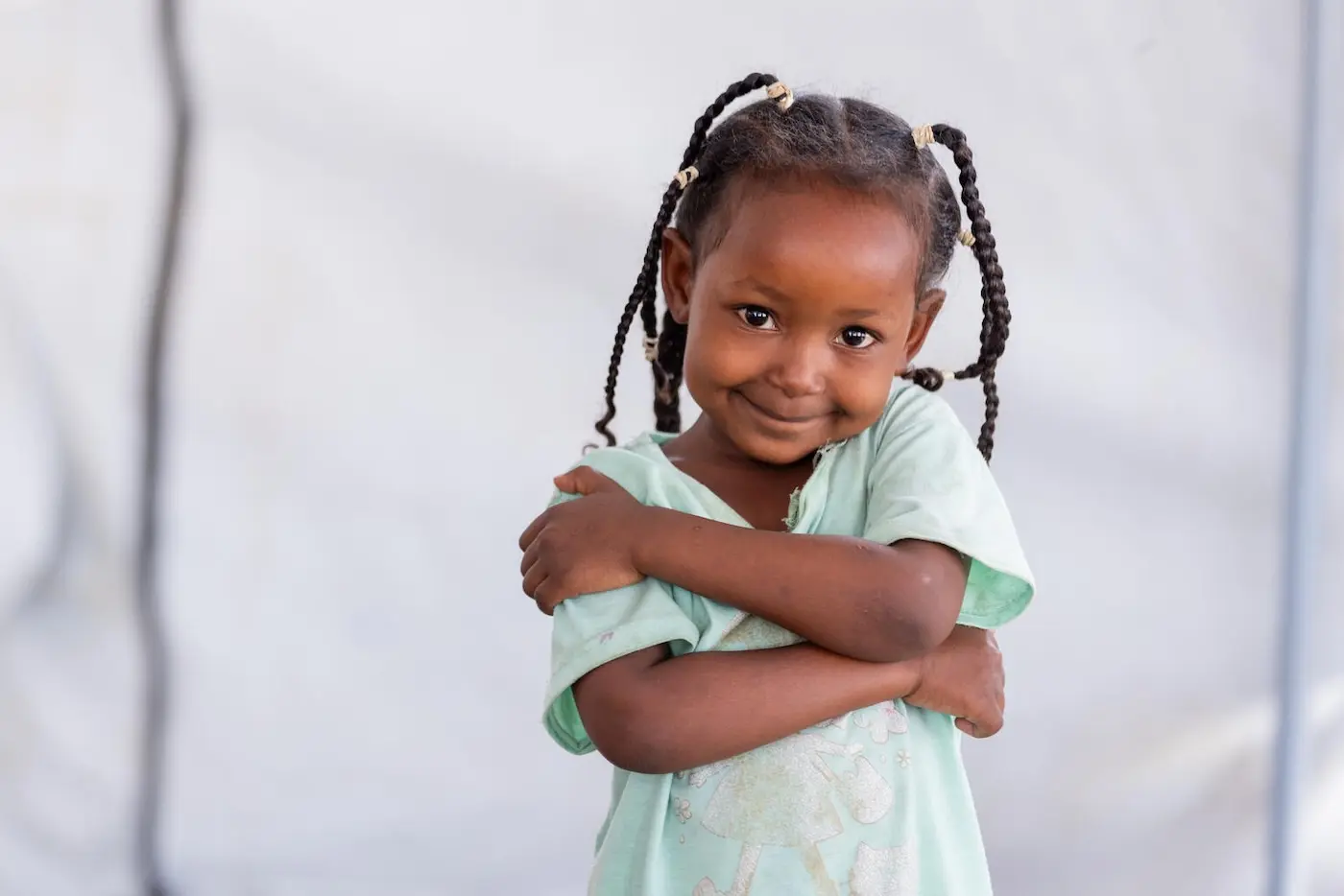 A 3 year old girl attends learning and play sessions at a Safe Learning Space in West Darfur, Sudan, supported by UNICEF.