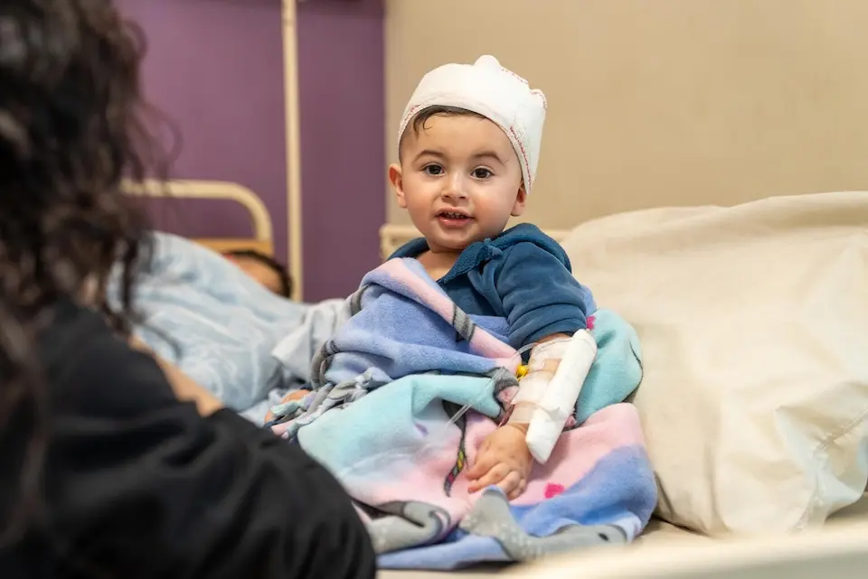 At a hospital in Beirut on April 9, 2026, a 10-month-old baby is treated for injuries sustained during an Israeli air strike.