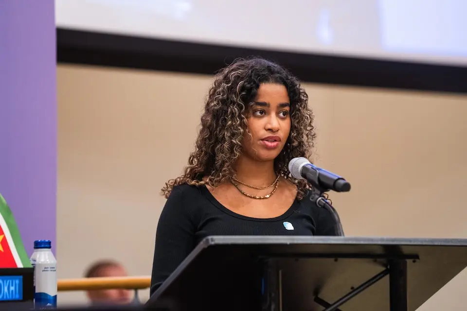 A UNICEF Youth Advocate speaks during a high-level event at the United Nations Headquarters in New York .