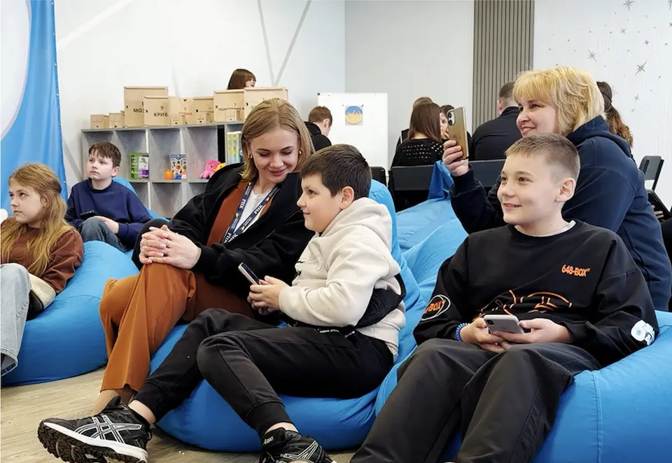 Children play and relax in a UNICEF child-friendly hub in Ukraine.