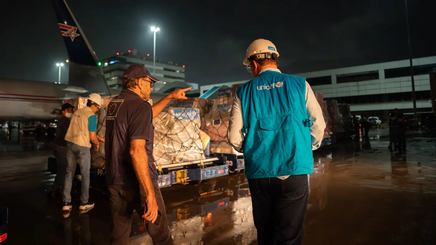 UNICEF workers receiving a shipment of supplies
