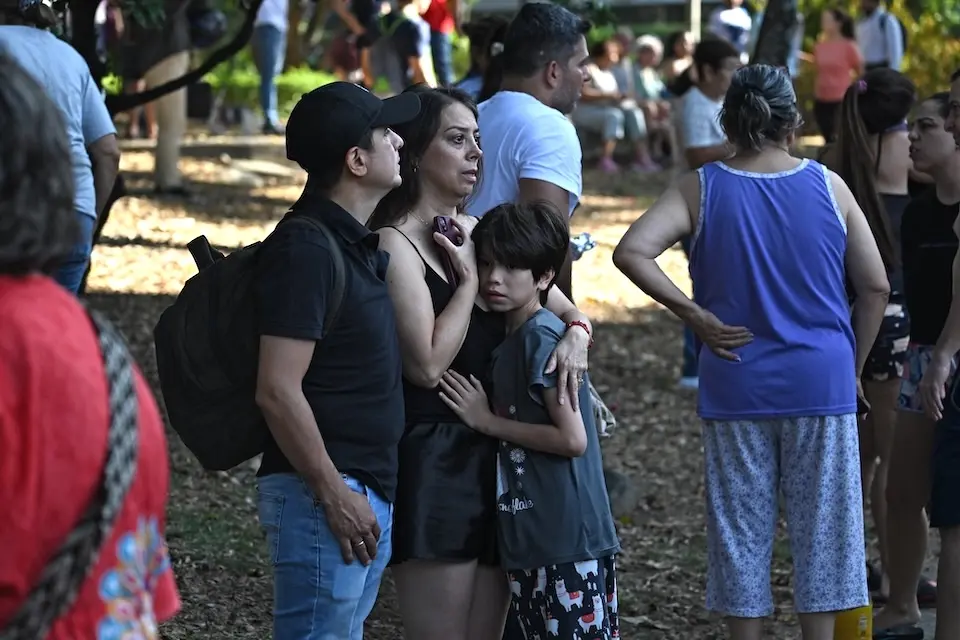 Families wait outside anxiously following a major earthquake in Colombia on Aug. 10. 2026.