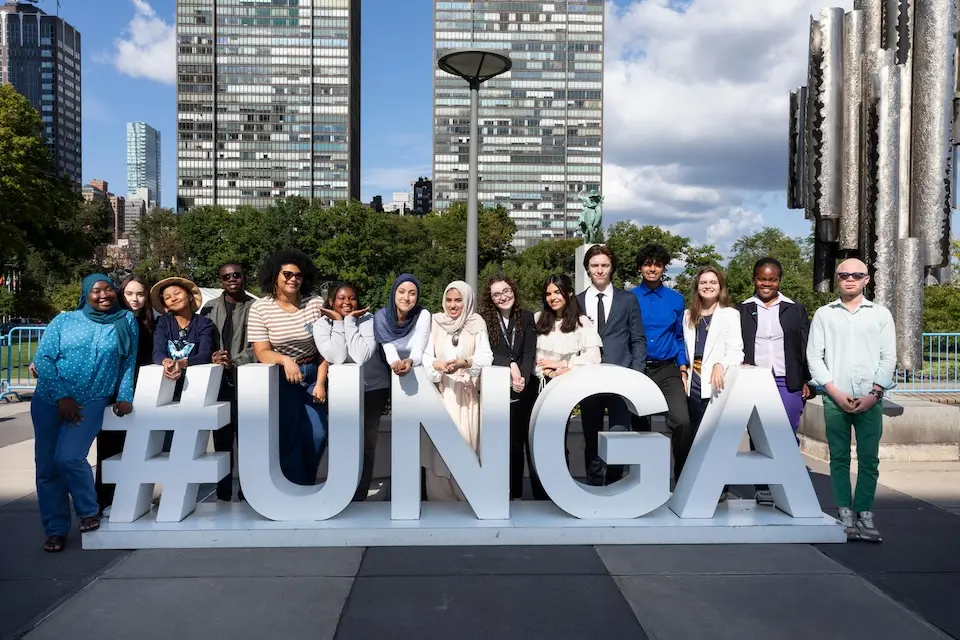 UNICEF Youth Advocates pose together for a photo outside UN Headquarters in New York before the 2024 General Assembly. © UNICEF /  UNI647568 / Tadej Znidarcic