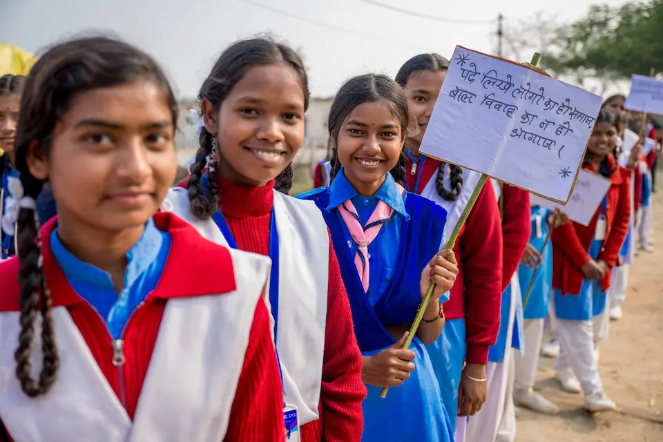 Girls in India advocate against child marriage.