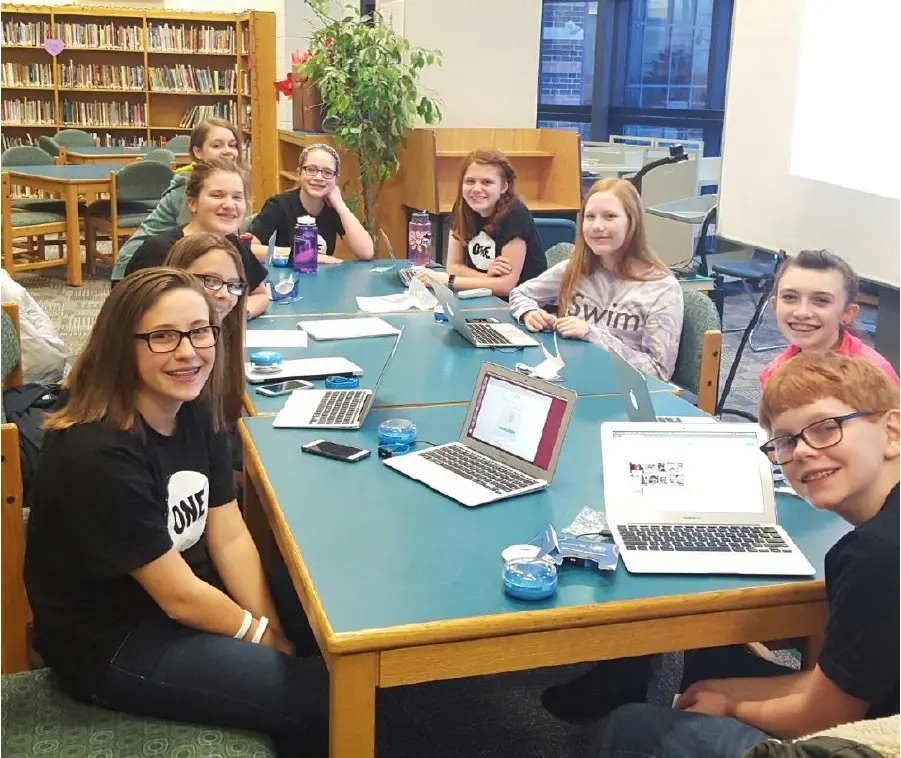 Kids at a Library Table