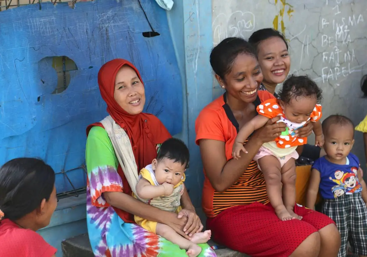 Two Women Holding Babies