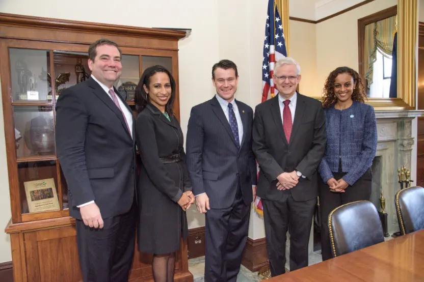 Semhar Araia (far right) meets with Sen. Todd Young (R-IN) (middle) to underscore the importance of diasporas 