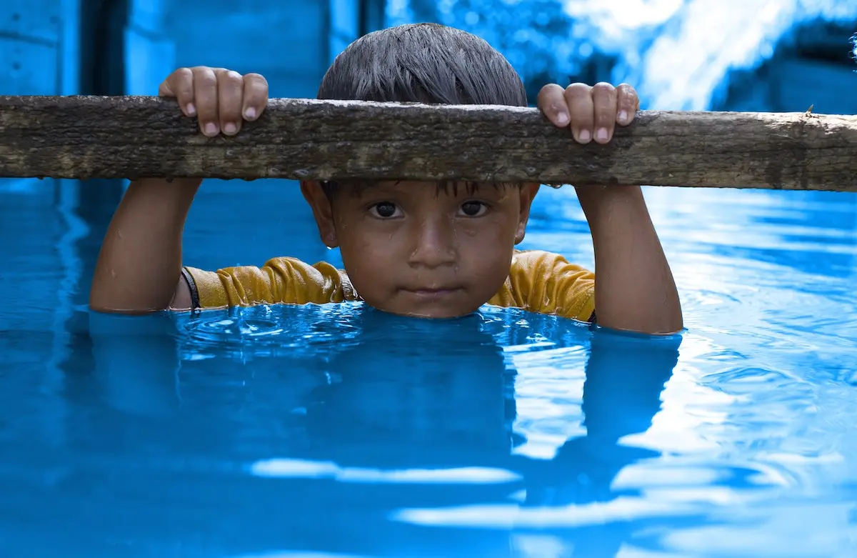 Boy in Floodwaters