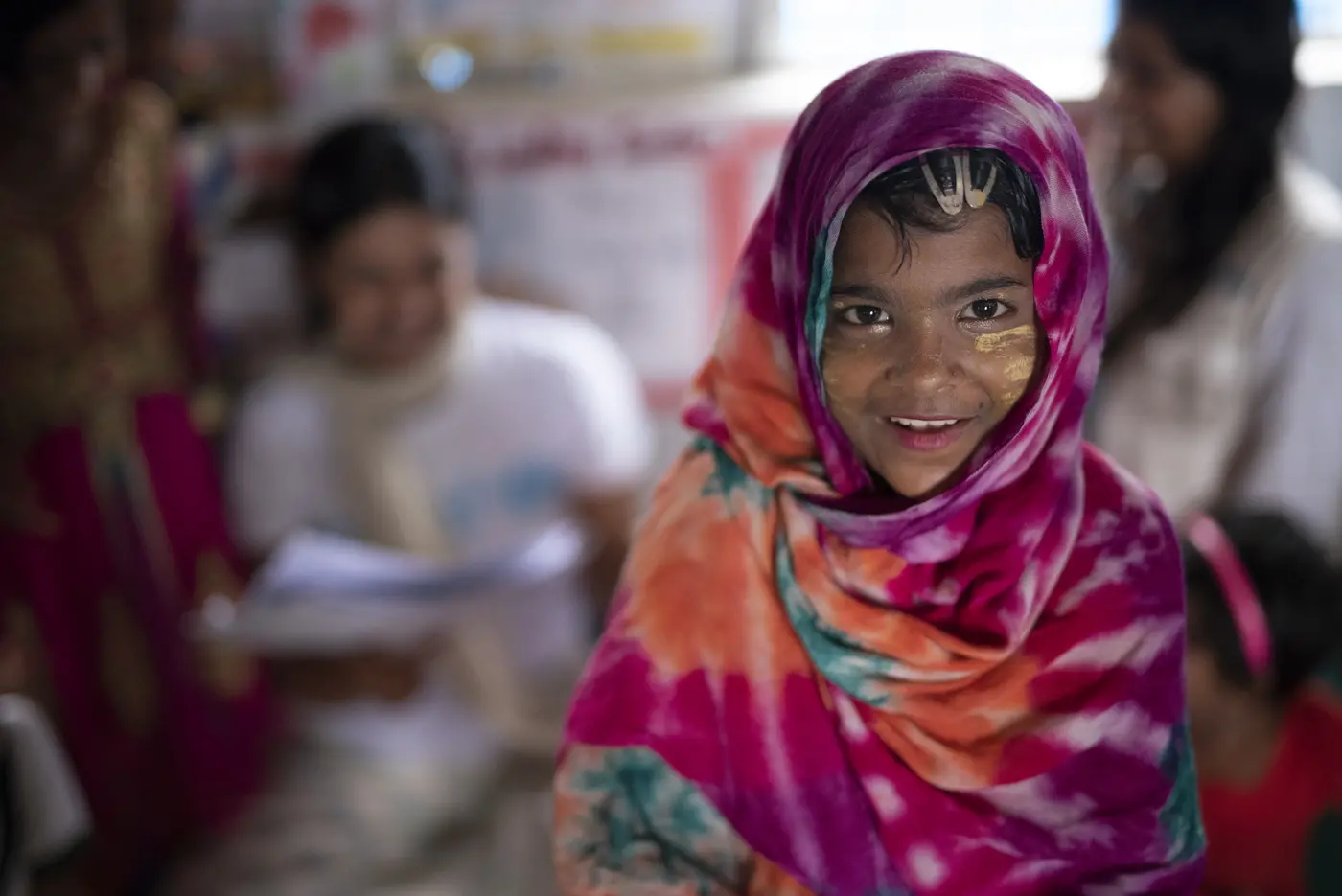 Girl in Pink Scarf Smiling