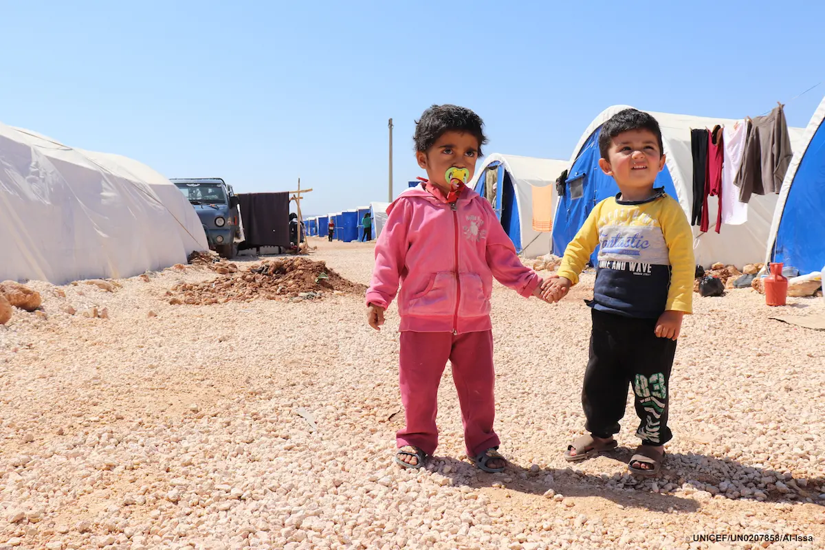 UNICEF USA's photo of the year features two young children from Syria photographed at the Fafin camp for displaced families located north of Aleppo. UNICEF USA's photo of the year features two young children from Syria photographed at the Fafin camp for displaced families located north of Aleppo.