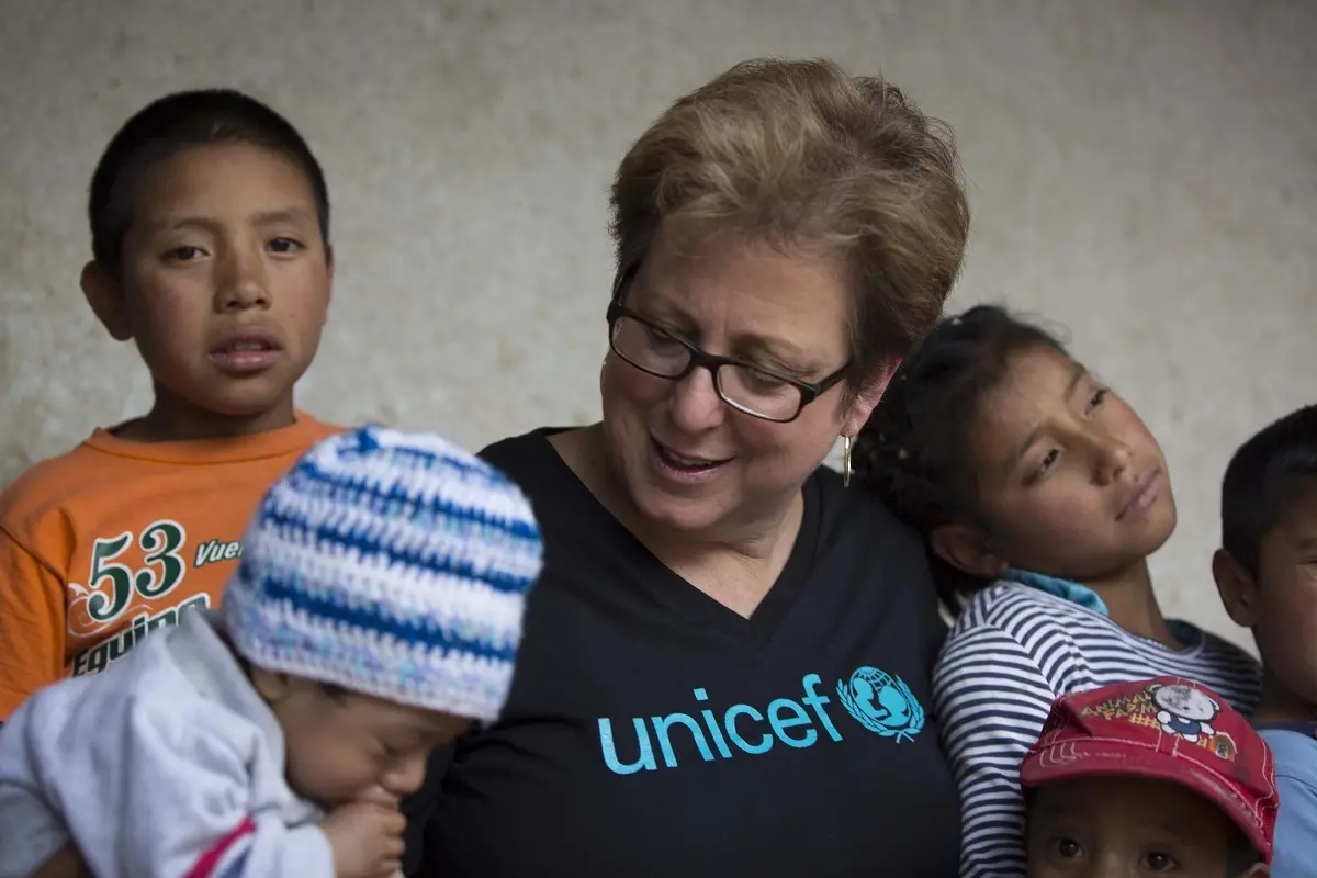 UNICEF USA President and CEO Caryl M. Stern visits with children in Guatemala in 2015.