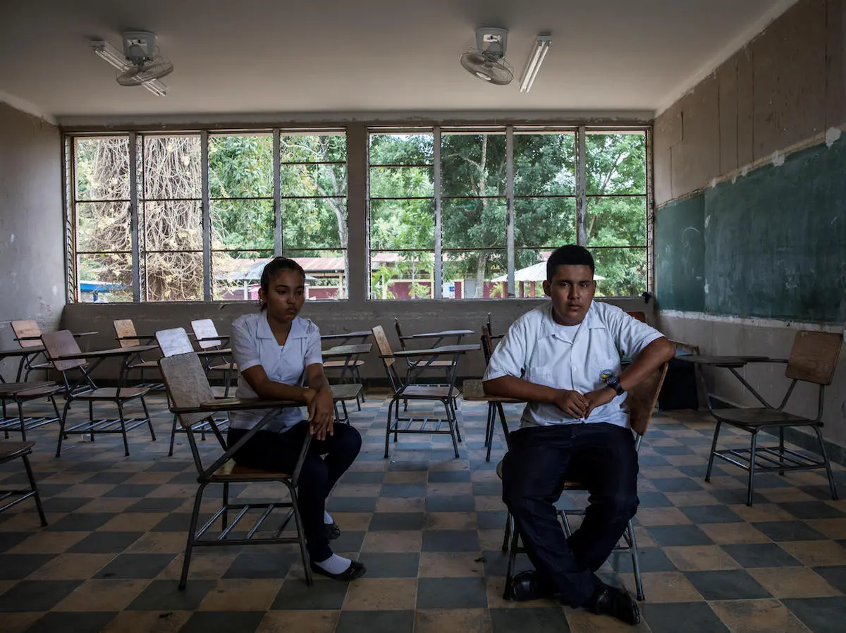 Josseline, 17 (left), Darwin, 16, and their friend Henry were targetted by bullies in Villanueva, Honduras. Henry committed suicide. 