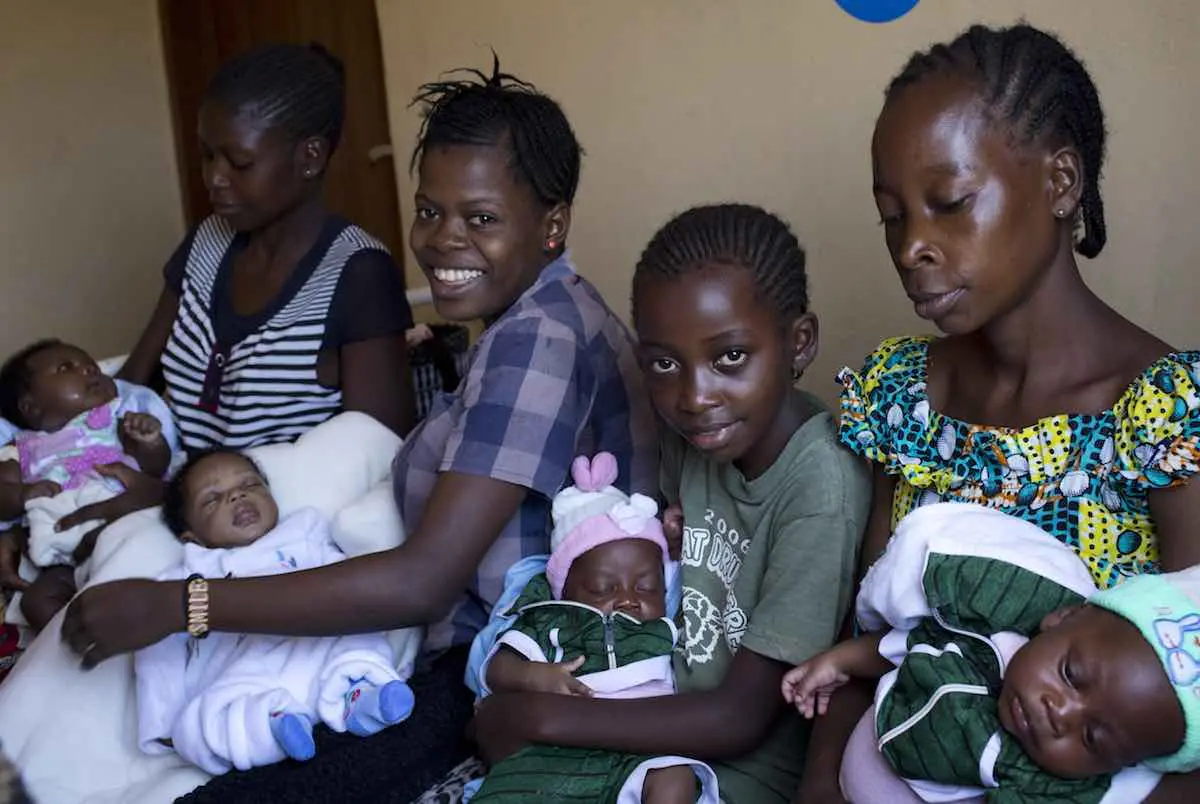 mothers prepare to have their babies vaccinated against measles, tuberculosis and polio, in Kalemi, Tanganyika province, Democratic Republic of Congo (DRC),13 November 2018. Health epidemics were a major concern in the 2017 with 55,000 cholera cases—the h